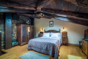 Отель Apartamentos Rurales Casa Riveras  Санта-Эулалиа-Де-Оскос